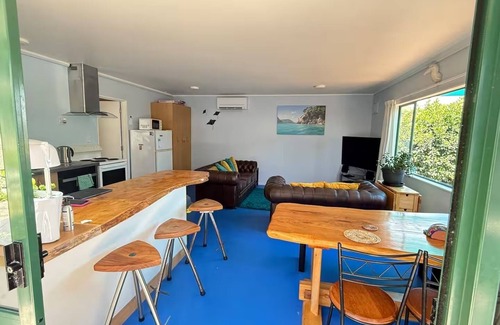 Tata Beach House | Beachside Bach Just across the road to Ligar Bay!