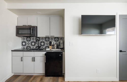 Oceanside Condo | Beachside Queen Suite Steps from the Sand (205)