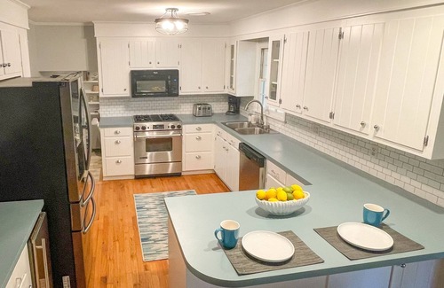 Isle of Palms House | Beachy haven with a beautiful screened in porch and big yard