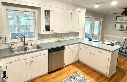 Isle of Palms House | Beachy haven with a beautiful screened in porch and big yard
