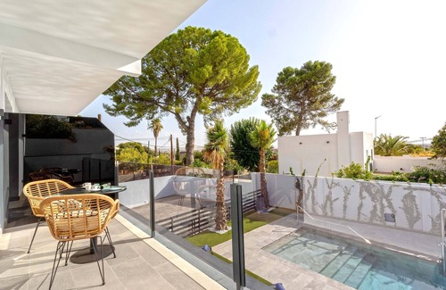 Distrito Norte Sierra Apartment | Beautiful 1 bd with terrace, pool and parking. Arruzafa III