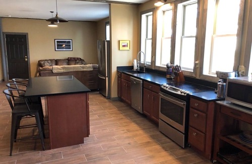Eastport Condo | Beautiful 2BR loft with views of bay and Eastport harbor activity.