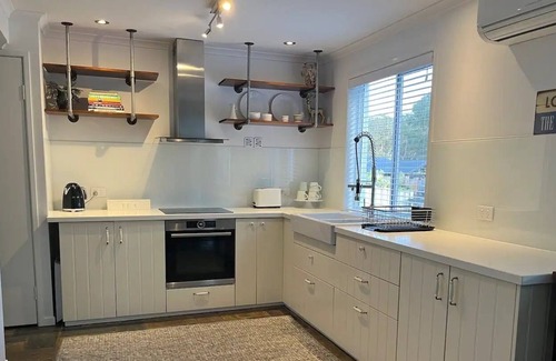 Sandstone Point House | Beautiful 3 bed home, tropical pool and garden, Sandstone Point. Dog Friendly!