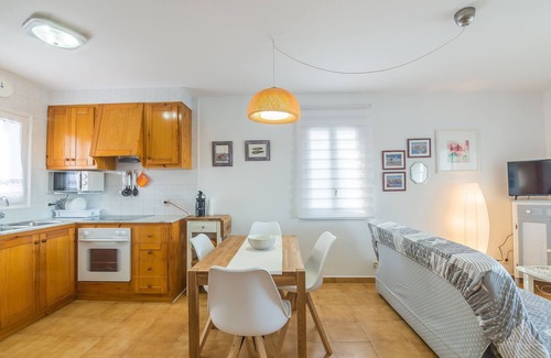 Arenal d'en Castell Apartment | Beautiful Apartment with Wi-Fi, Pool, Terrace and Sea View