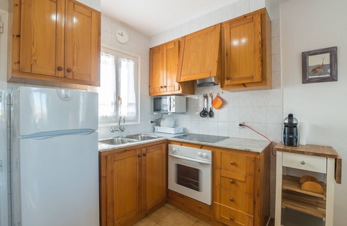 Arenal d'en Castell Apartment | Beautiful Apartment with Wi-Fi, Pool, Terrace and Sea View