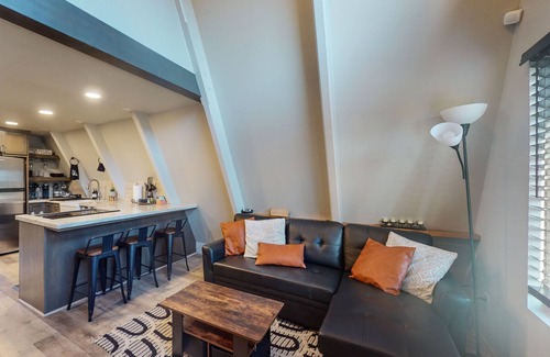 West Village Cabin | Beautiful A-frame home with spacious deck, firepit, loft, & nearby activities