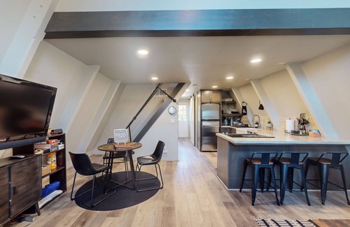West Village Cabin | Beautiful A-frame home with spacious deck, firepit, loft, & nearby activities