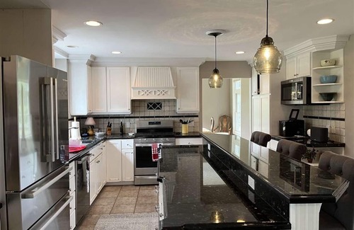 Harbor Springs House | Beautiful acre and a half treed lot with 5 beds and a hot tub in Harbor Springs.