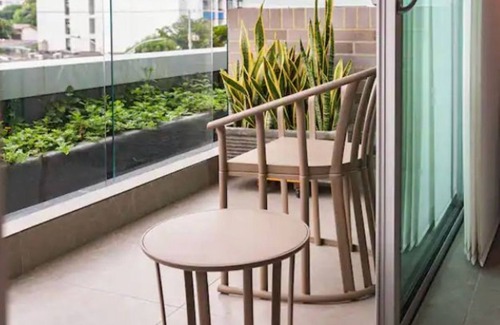 Riomar Apartment | Beautiful and modern loft with balcony, jacuzzi and privileged location District 90