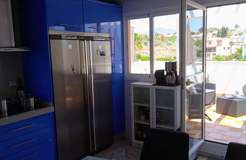 Caleta de Velez Apartment | Beautiful apartment with sea view, pool and golf course