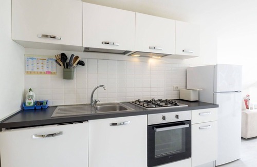 Meina Apartment | Beautiful apartment for 4 guests with A/C, pool, TV, balcony and parking