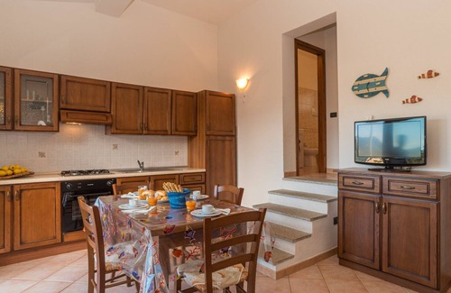 Porto Pollo Apartment | Beautiful apartment for 4 guests with WIFI, TV, terrace, pets allowed and parking