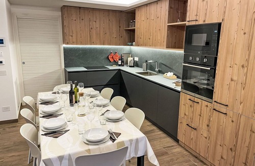 Bianzone House | Beautiful apartment in villa for 8 guests with A/C, WIFI, TV, terrace, pets allowed and parking