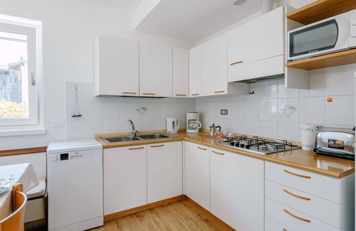 Caldonazzo Apartment | Beautiful apartment for 4 people with WIFI, TV, patio, pets allowed and parking