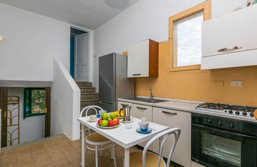 Follonica Villa | Beautiful apartment in villa for 6 guests with WIFI, pool, TV, patio and pets allowed