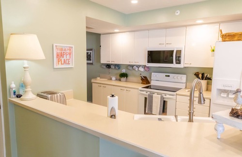 Ponce Inlet Condo | Beautiful beach and property with lots of room in our corner unit.