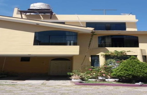 Tacna House | Beautiful Bedroom in Hostal Mochileros Tacna