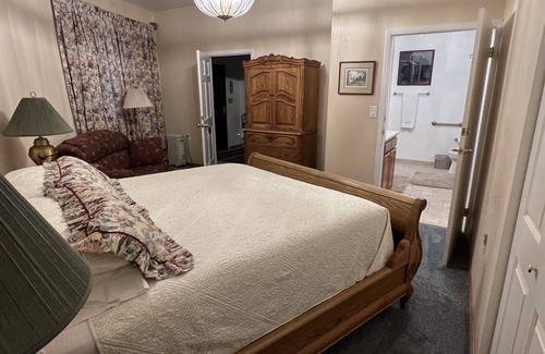 Healy Bed & Breakfast | Beautiful bedroom with king bed and large tiled shower, Room 5