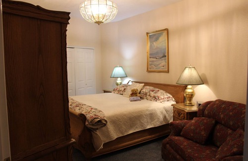 Healy Bed & Breakfast | Beautiful bedroom with king bed and large tiled shower, Room 5