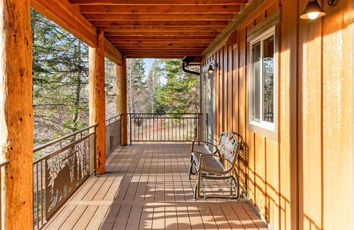 Bigfork House | Beautiful cabin overlooking Swan Lake with 2-level deck, fireplace & firepit