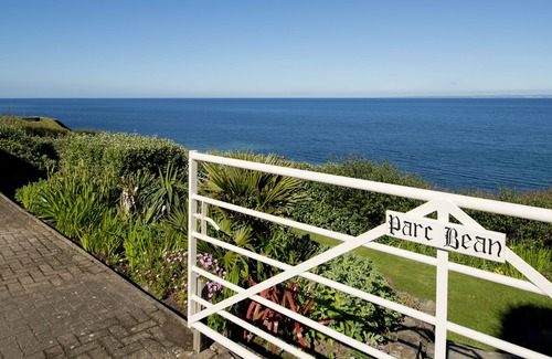 Gunwalloe House | Beautiful Cliff Top Cornish House with outstanding sea views overlooking beach