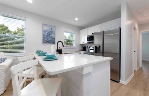 Neptune Beach Apartment | Beautiful coastal condo - walk to the beach!