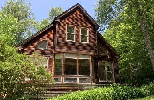 Brownsville House | Beautiful craftsman-built home with natural wood and large windows in every room