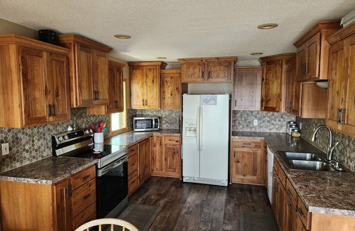 Battle Lake House | Beautiful, family friendly Lake home w/sunroom and 100ft of sandy beach!