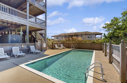 Waves House | Beautiful Home with pool, hot tub, AC, W/D, & fireplace