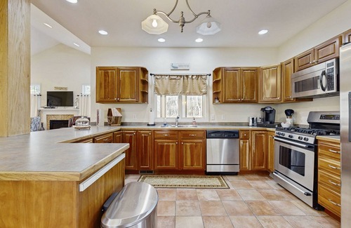 Lagoon Heights House | Beautiful home with screened porch, deck, W/D, family room, & central AC