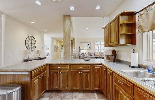 Lagoon Heights House | Beautiful home with screened porch, deck, W/D, family room, & central AC