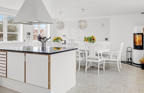 Ronne House | Beautiful, inviting two-story vacation rental with a cozy terrace that provides ocean views, comfort