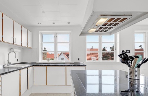 Ronne House | Beautiful, inviting two-story vacation rental with a cozy terrace that provides ocean views, comfort