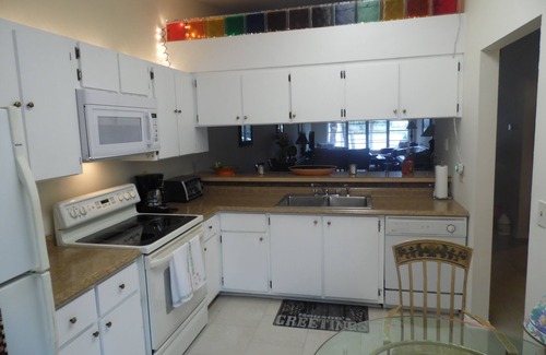 East Naples Condo | Beautiful lake view huge pool 4 miles to Gulf beaches