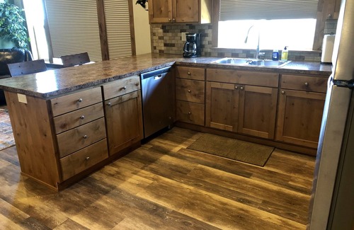 Ashton Apartment | Beautiful loft apartment overlooking the Henry’s Fork River at the Ora Bridge!