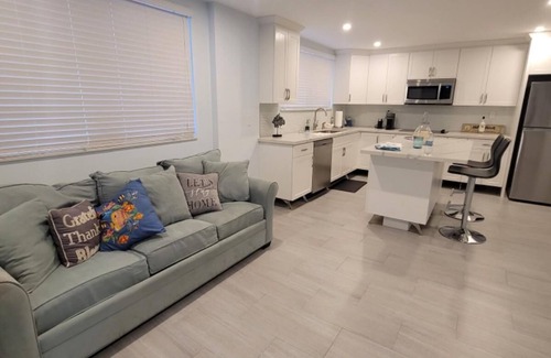 Rock Harbor House | Beautiful lower floor unit furnished on a quiet and private street
