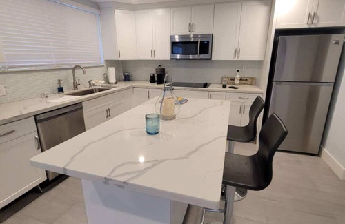Rock Harbor House | Beautiful lower floor unit furnished on a quiet and private street