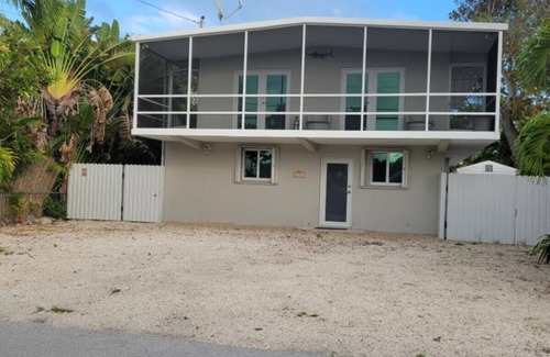 Rock Harbor House | Beautiful lower floor unit furnished on a quiet and private street