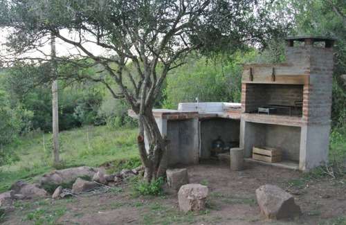 La Floresta House | Beautiful mud house in Villa Serrana with WIFI