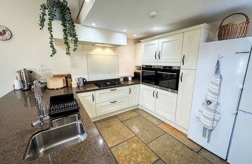 Kelbrook House | Beautiful old barn converted into holiday accommodation with a woodfired hot tub