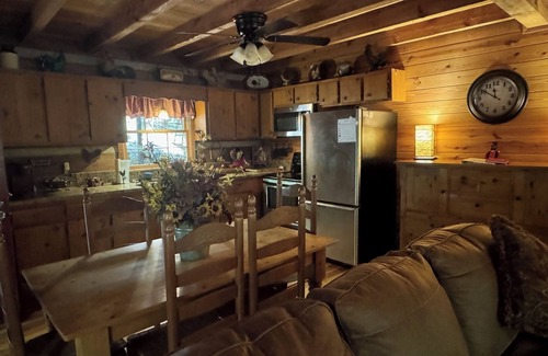 Dial Cabin | Beautiful Real Log Cabin. Not your average cabin! Hot Tub. Wifi. Fire Pit