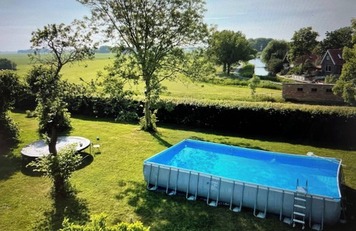 Pingjum House | Beautiful Retreat with Hot Tub, Sauna, and Pool in an Authentic Farmhouse