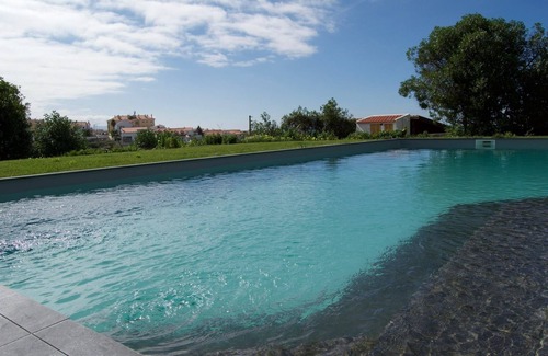 Ericeira House | beautiful surf villa surrounded by spacious garden and salt water pool