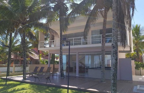 Maranduba House | Beautiful upscale house standing on the sand (4 suites and large gourmet sea view area)