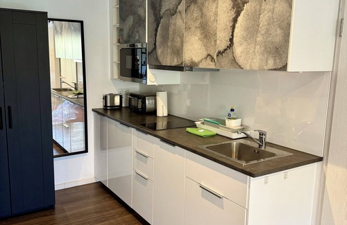 Hemmelsdorf Apartment | Beautiful vacation apartment by the lake with its own garden within cycling distance of the beach
