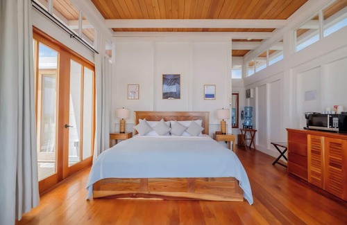 San Pedro Hotel | Beautiful Villa with Private Beach, Swimming Pool, and Free Airport Shuttle!