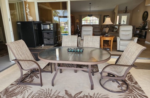 Burnt Store Isles House | Beautiful, waterfront home with amazing view, private heated pool, & central AC