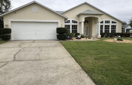 Sunridge Woods House | Beautiful Waterfront Home with Heated Pool and Game Room