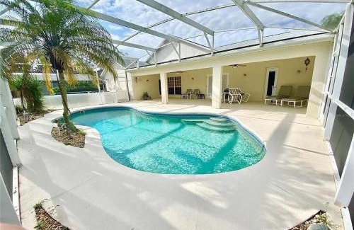 Sunridge Woods House | Beautiful Waterfront Home with Heated Pool and Game Room