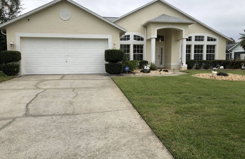 Sunridge Woods House | Beautiful waterfront home with heated pool and game room.